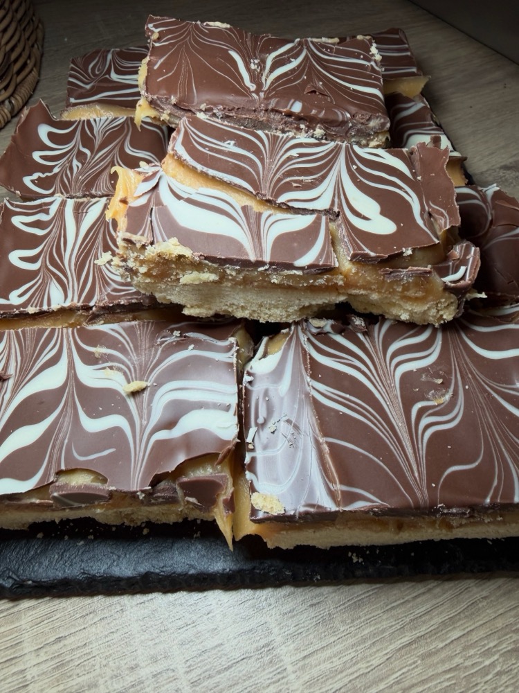Millionaire's shortbread with a marbled chocolate top