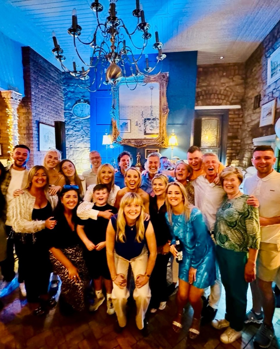A large group photo at a private celebration at 4C